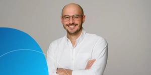 Retorio man standing and smiling