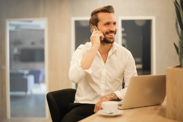 Retorio man on the phone at a desk